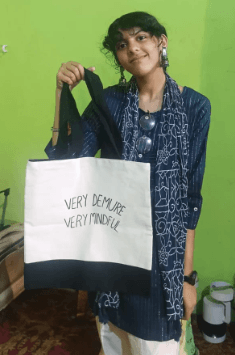 Customer showing off Jhola Junction tote bag
